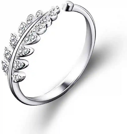 Silver-tone ring with leaf design and embedded clear crystals.