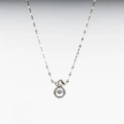 Silver necklace featuring a circular pendant with a central clear stone.